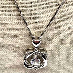 Sterling Silver Heart & Knot Pendant Necklace With Sparkling Cubic Zirconia
